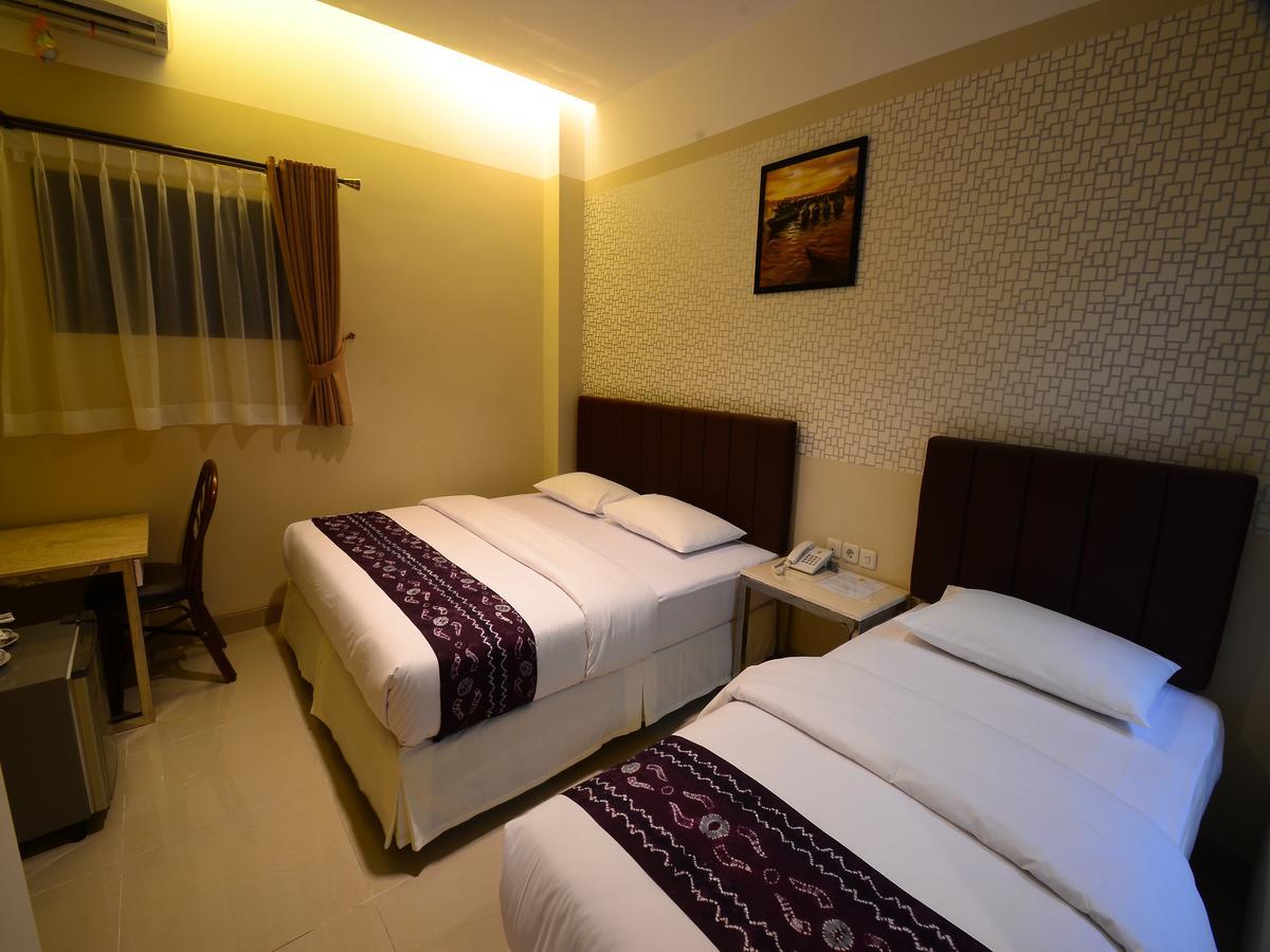 Queen City Hotel Banjarmasin Banjarmasin  Extérieur photo